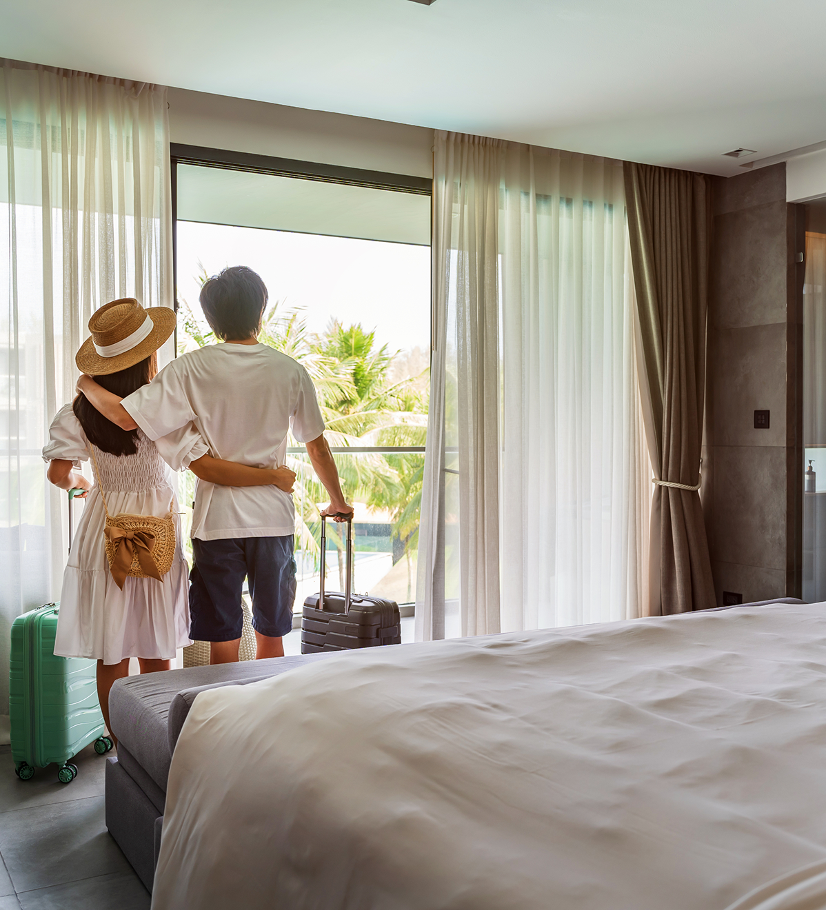 Travelers admiring scenic balcony view