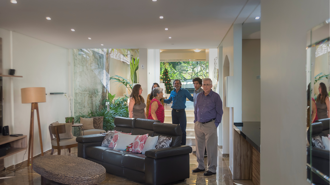 Group touring modern living room