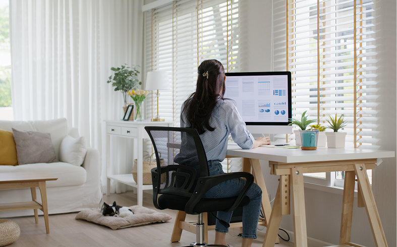 Woman working in home office setup